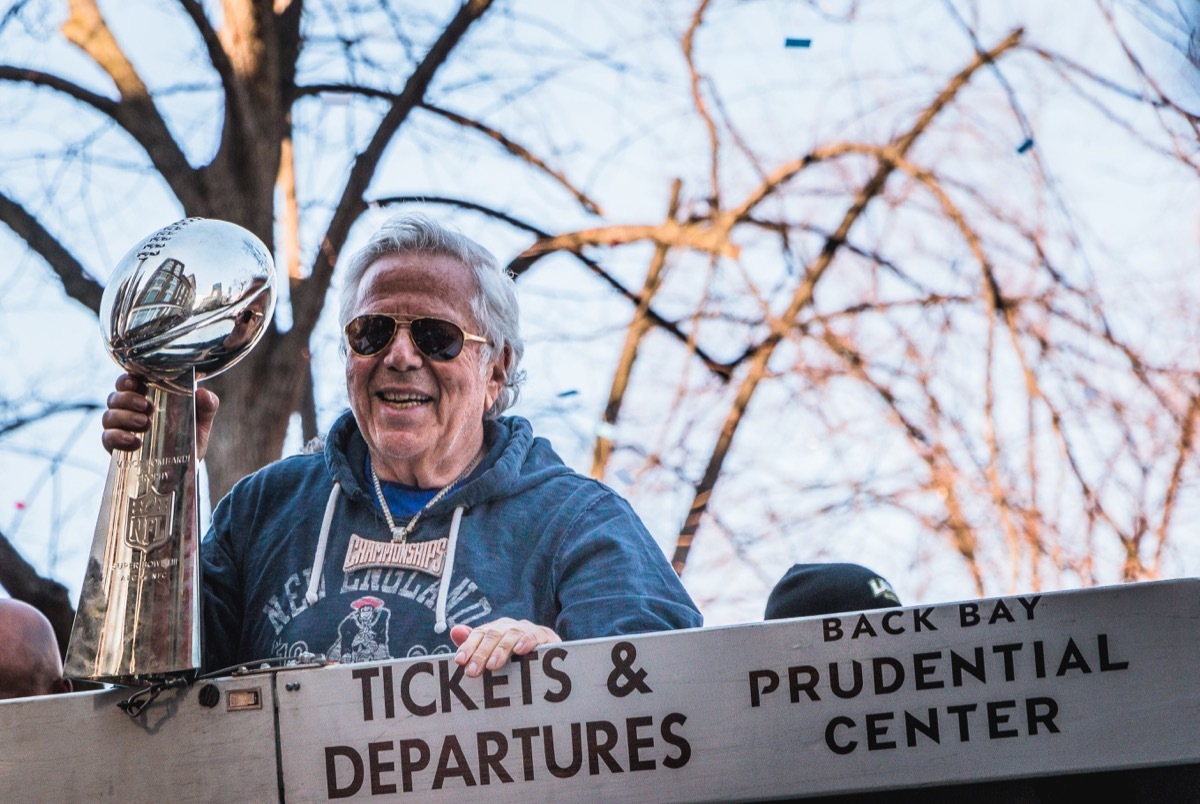 Patriots owner Robert Kraft holding the Lombardi Trophy