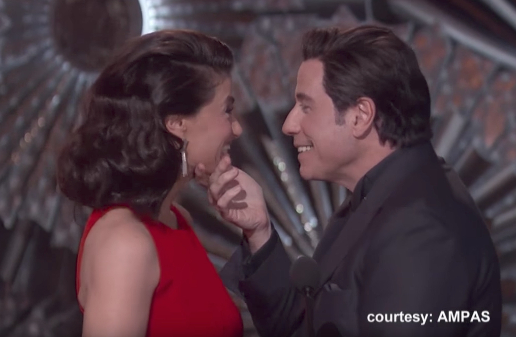 John Travolta Touches Idina Menzel's Face Oscars Jokes