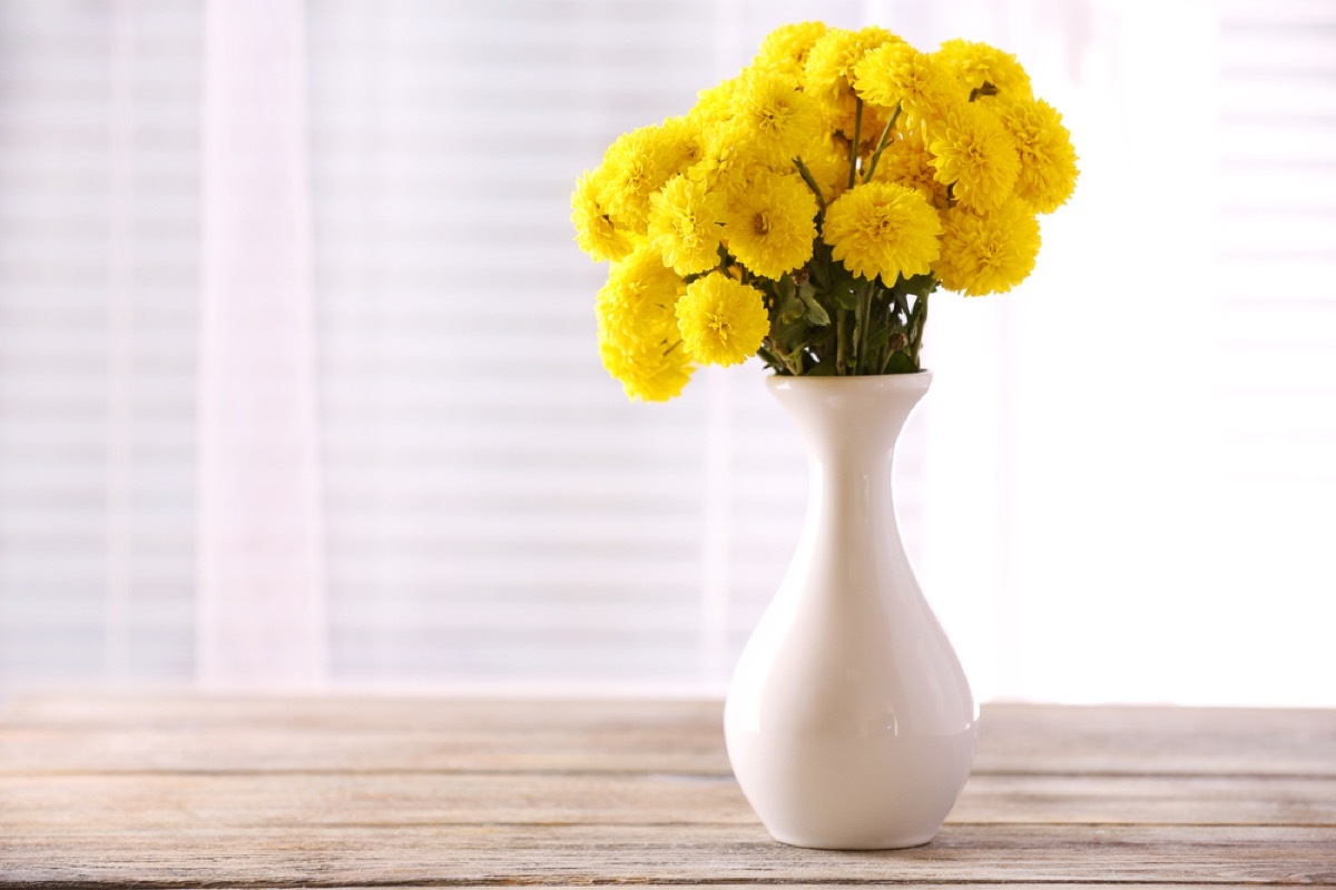 yellow flowers in white vase, old school cleaning tips