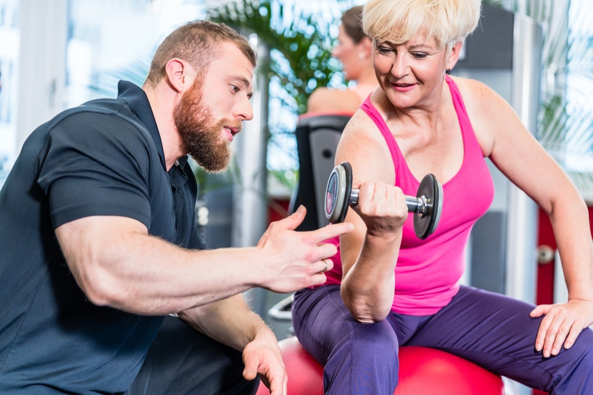 Older woman with a personal trainer