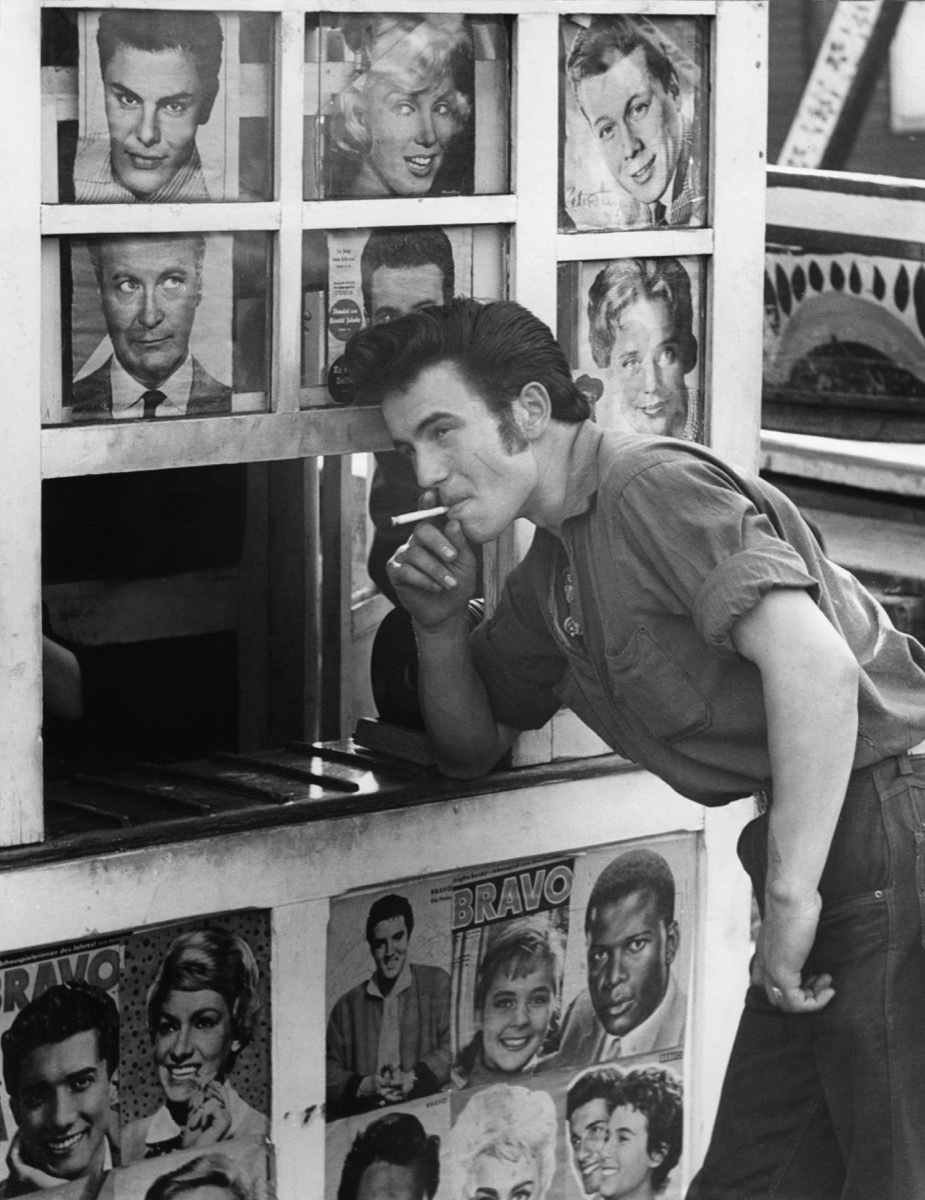 1950s male teen greaser smokes cigarette, cool grandparents