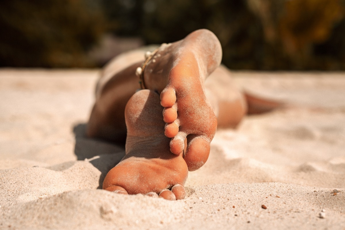 woman tanning on the beach