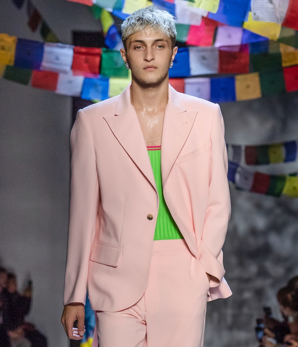 anwar hadid in pink suit on runway