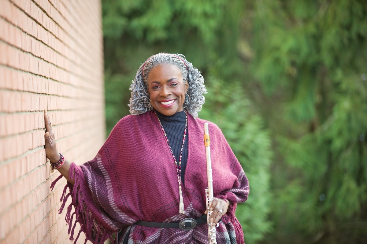 woman outdoors wearing a pashmina wrap over her outfit