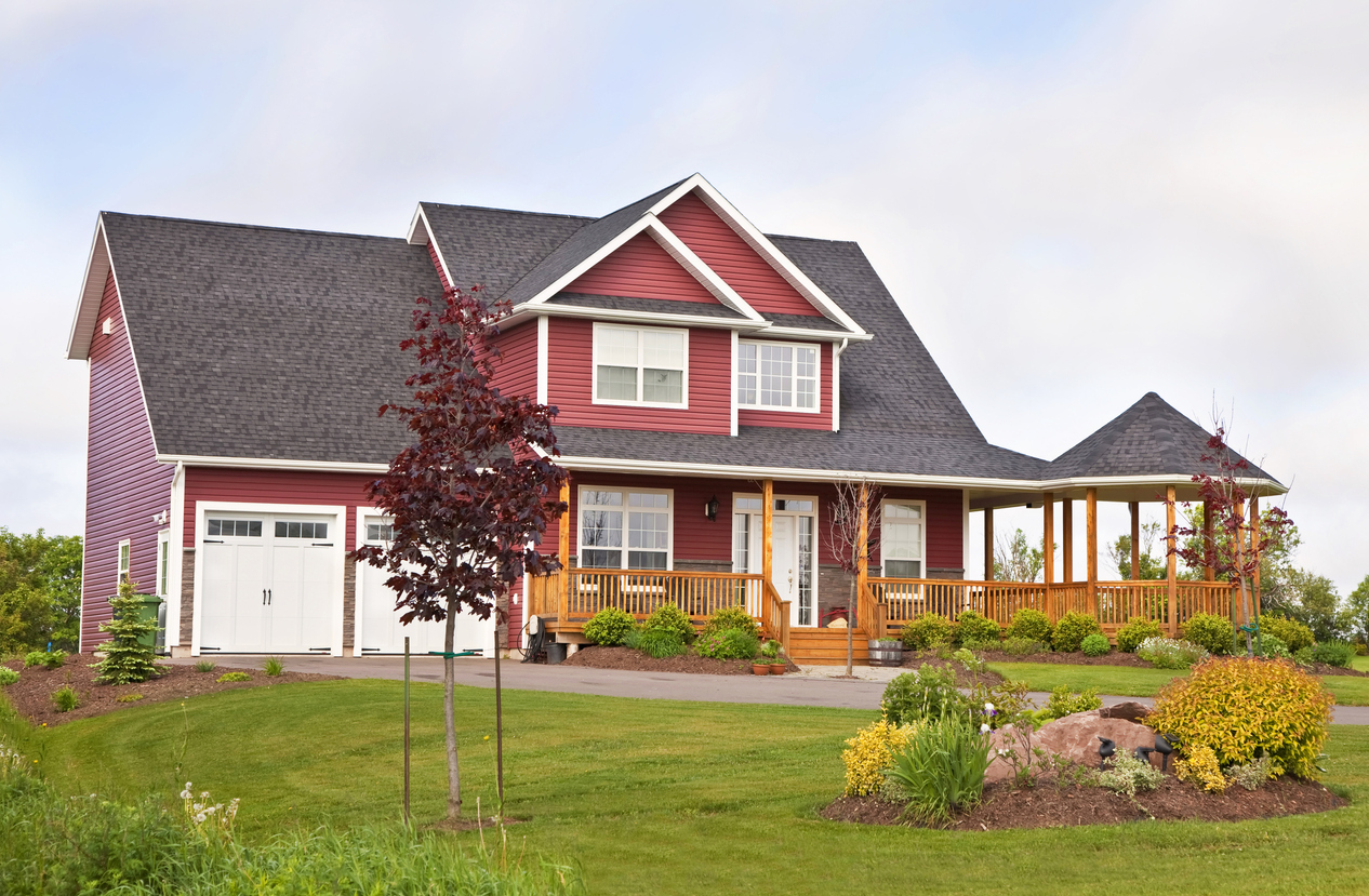 A two storey typical North American home in dark red