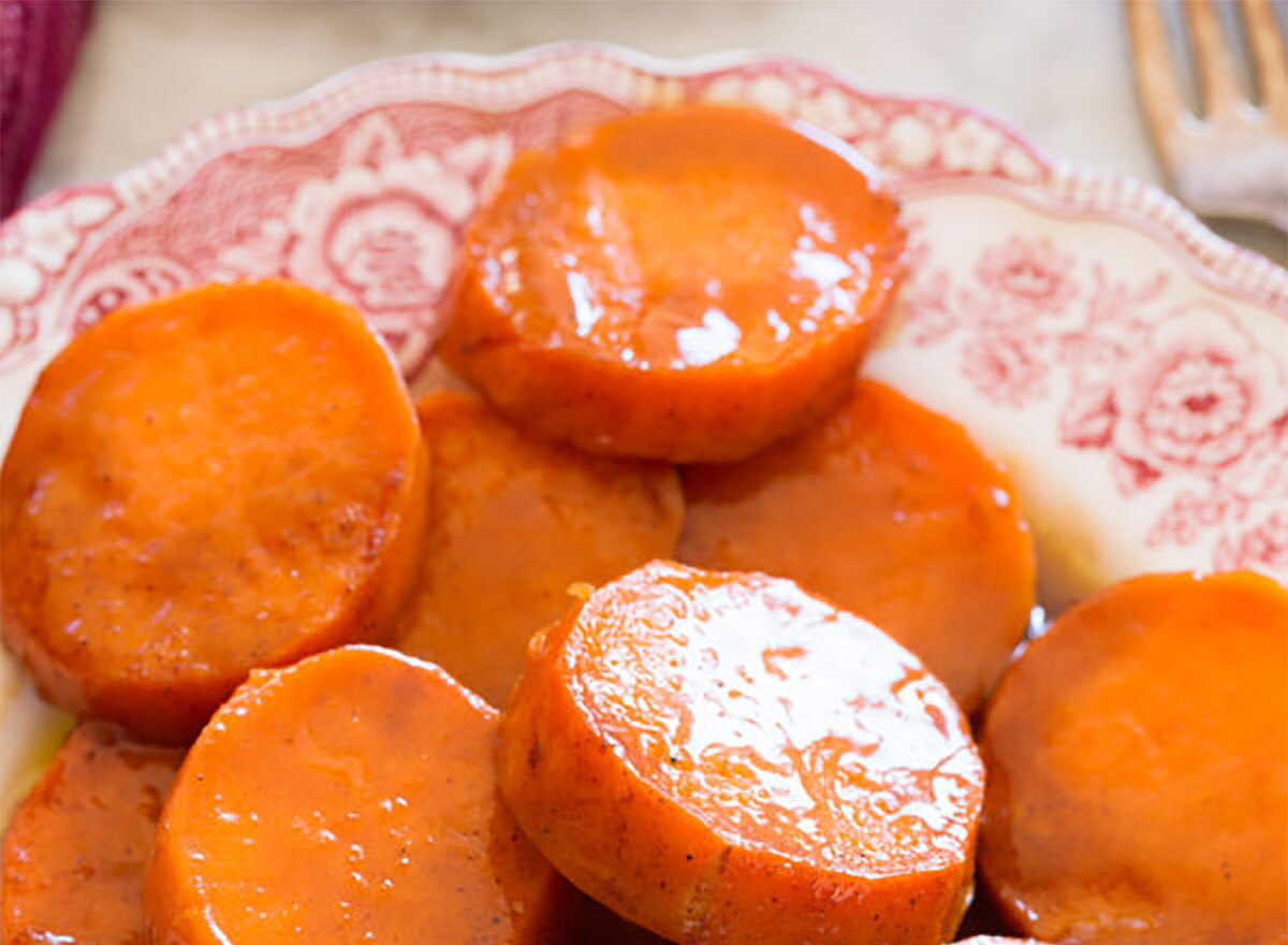 candied yams on plate with fork