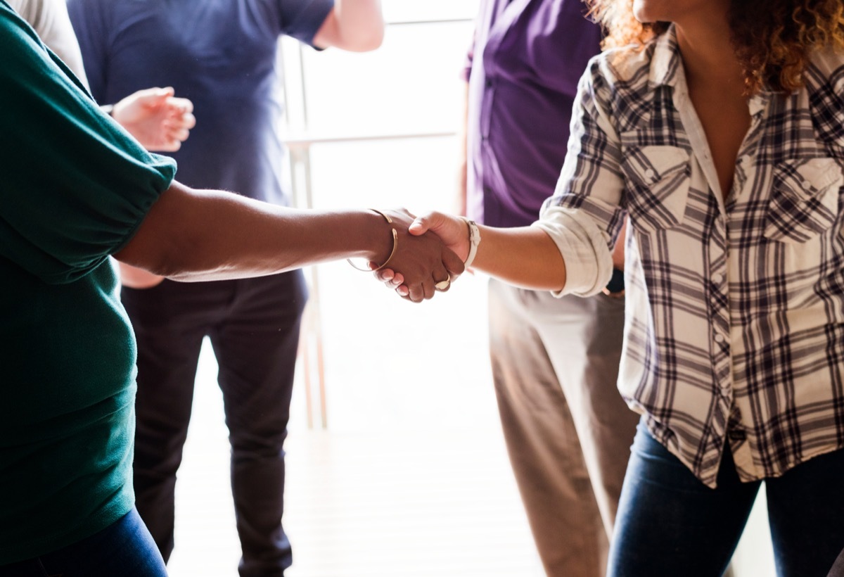 woman shaking hands