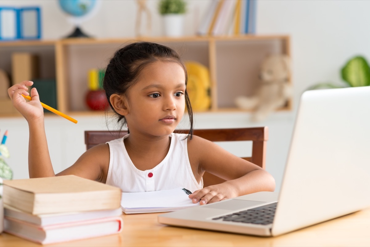 Young girl doing online work