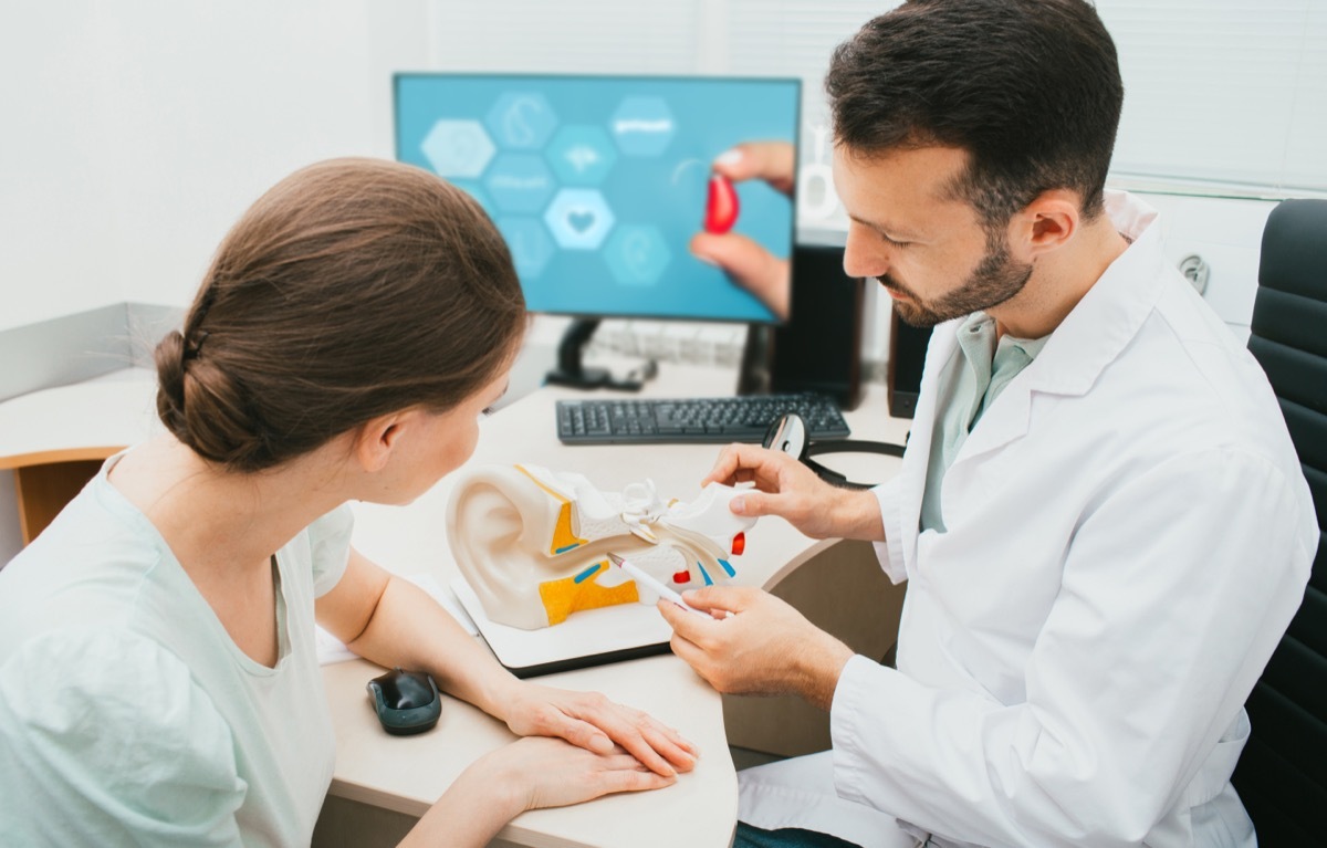 Woman Meeting with Audiologist