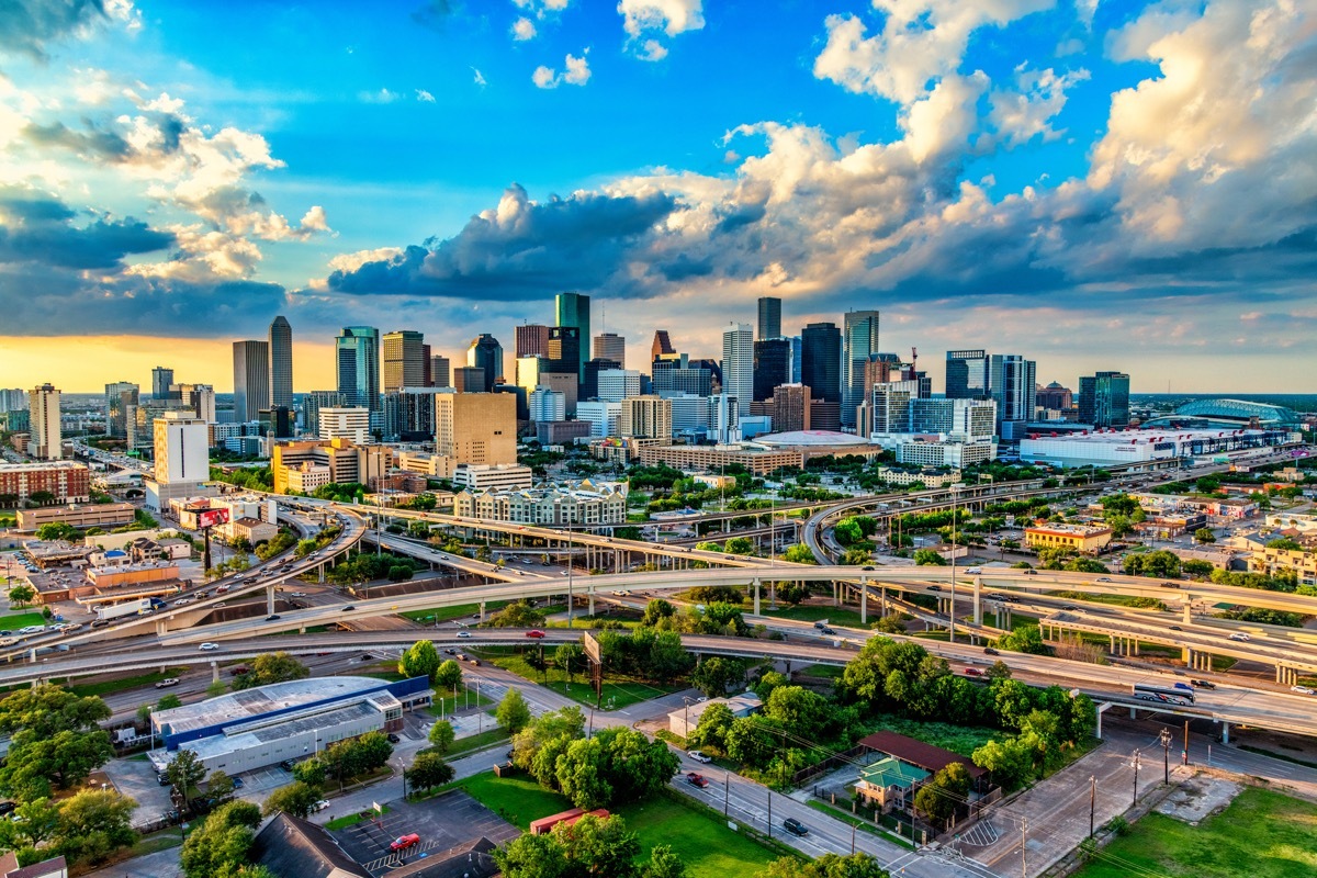 The skyline of Houston, Texas at sunset shot from an altitude of about 600 feet .