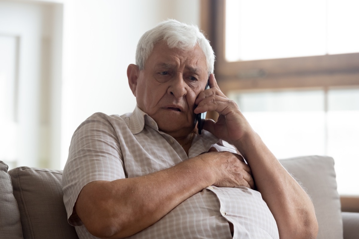 Man stressed on phone call