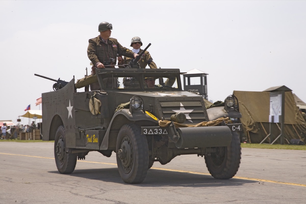 Actor of General George Smith Patton, Jr. stands up in jeep during reenactment parade of World War II in Reading, Pennsylvania