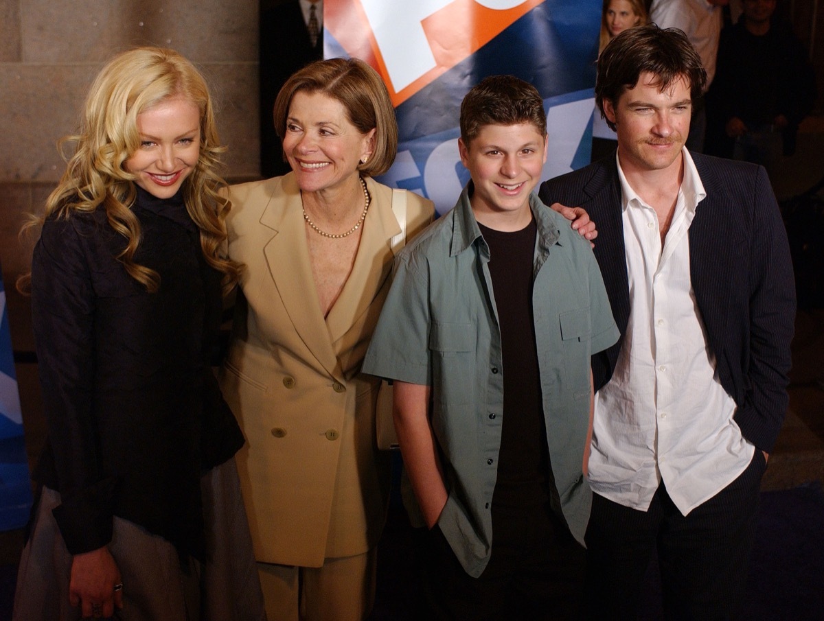 jessica walter, portia de rossi, michael cera, and jason bateman smiling on red carpet