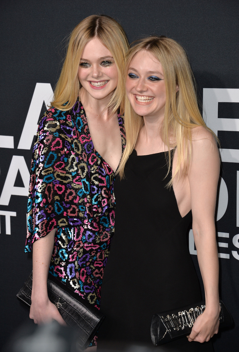 Elle and Dakota Fanning at a Saint Laurent fashion show in 2016