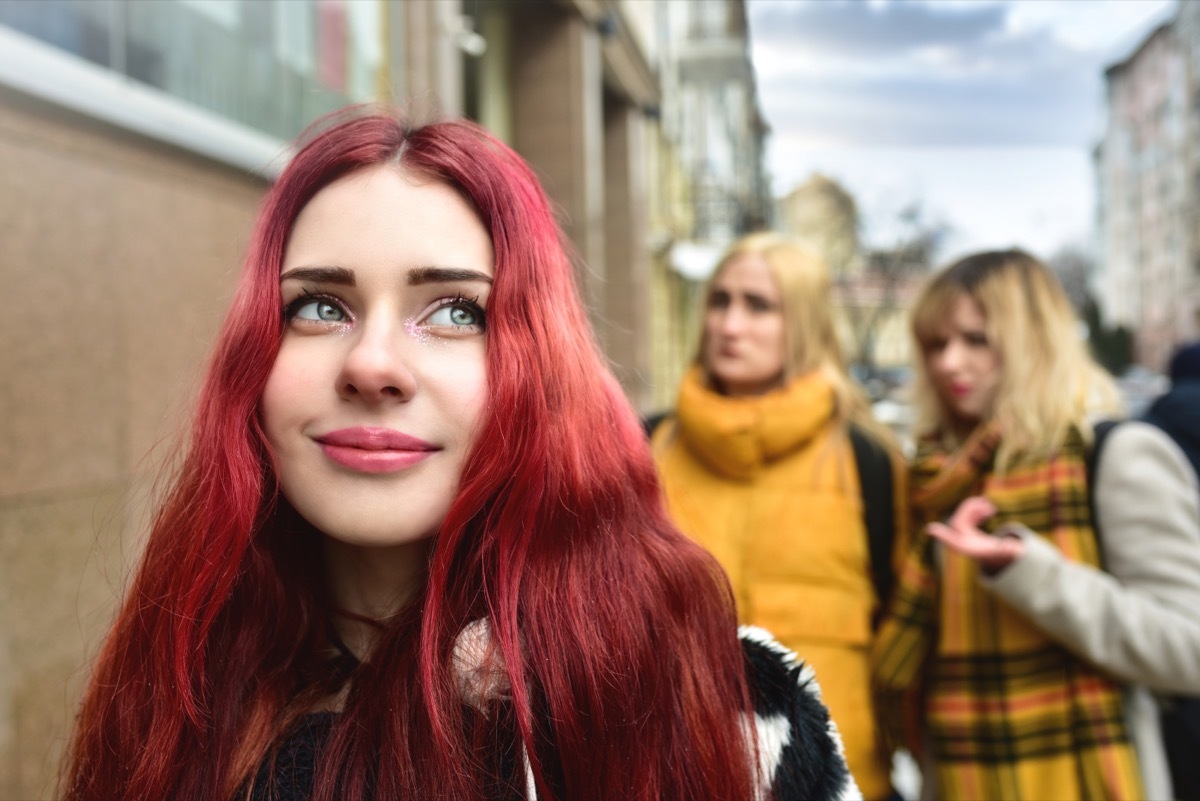 Young girl Ignoring Gossip