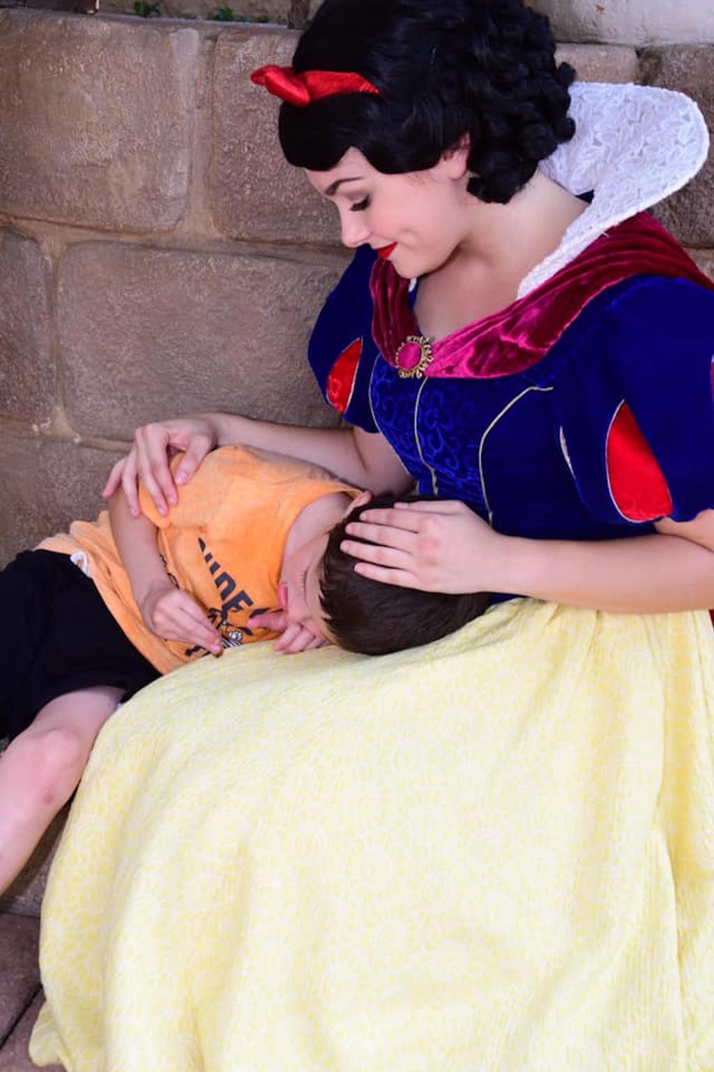 snow white comforts child with autism