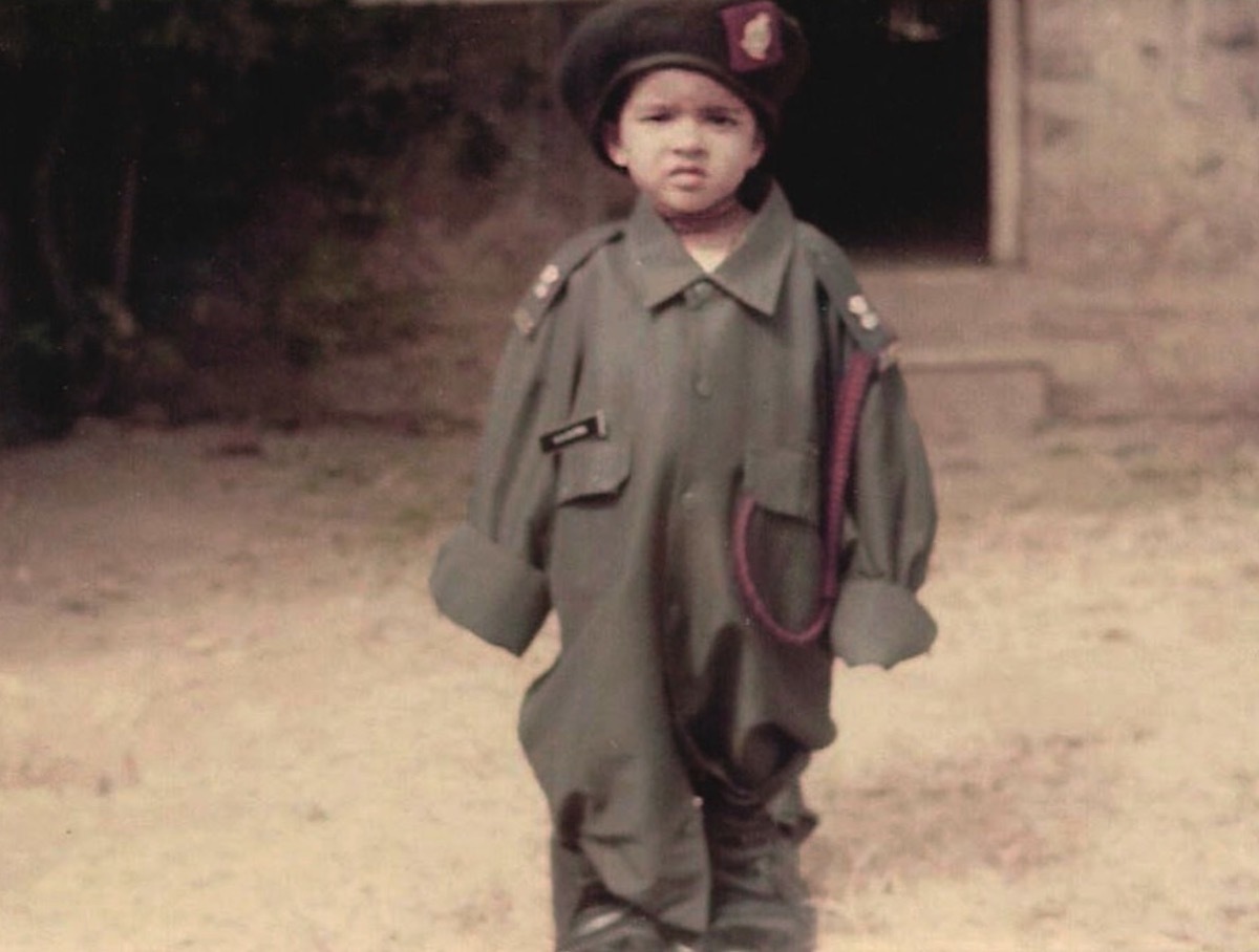 priyanka chopra as a baby wearing an army uniform and beret