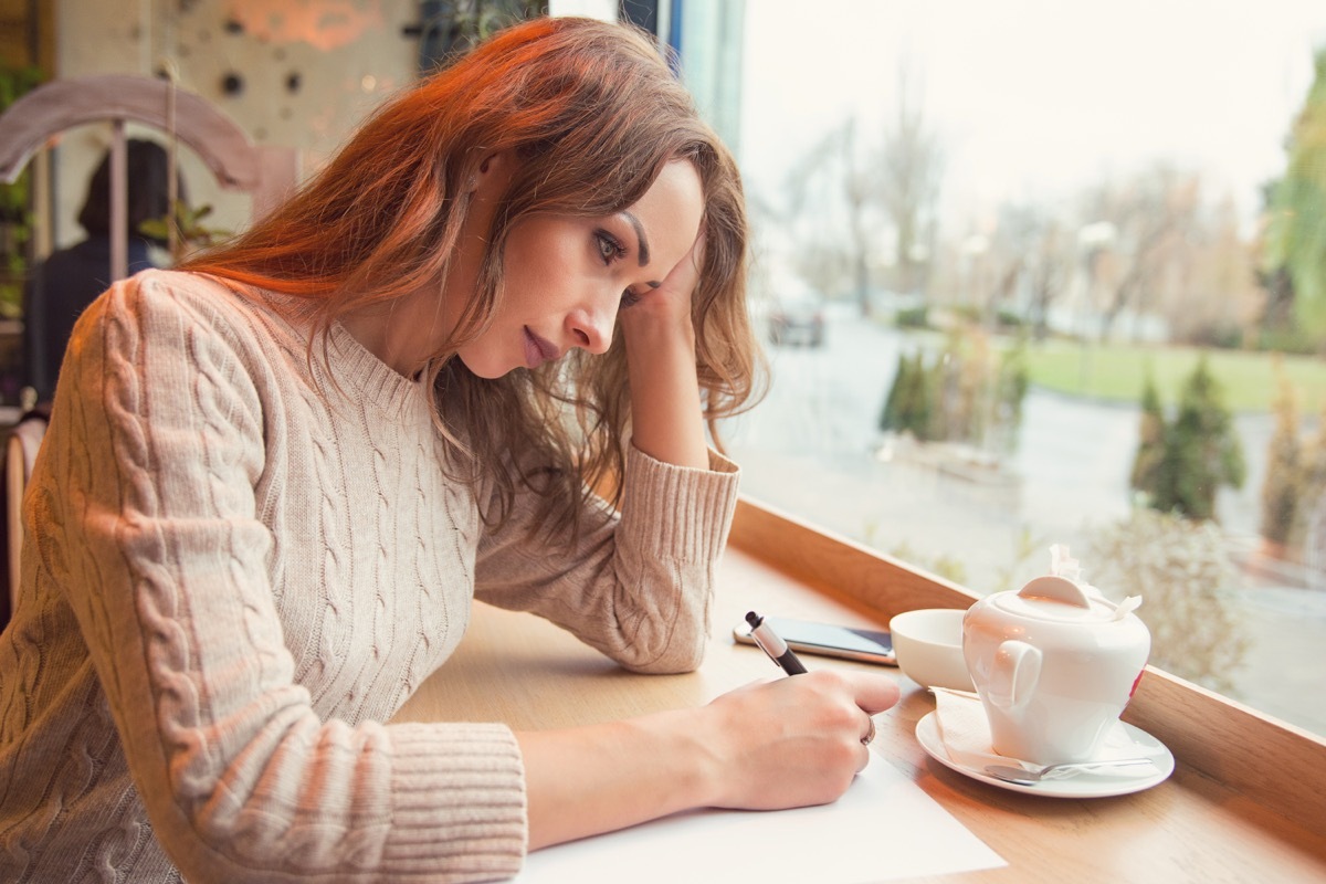 Young Woman Writing a Love Letter