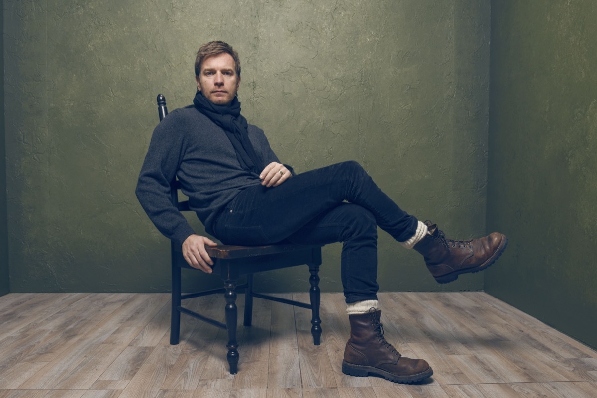 ewan mcgregor sitting in a chair