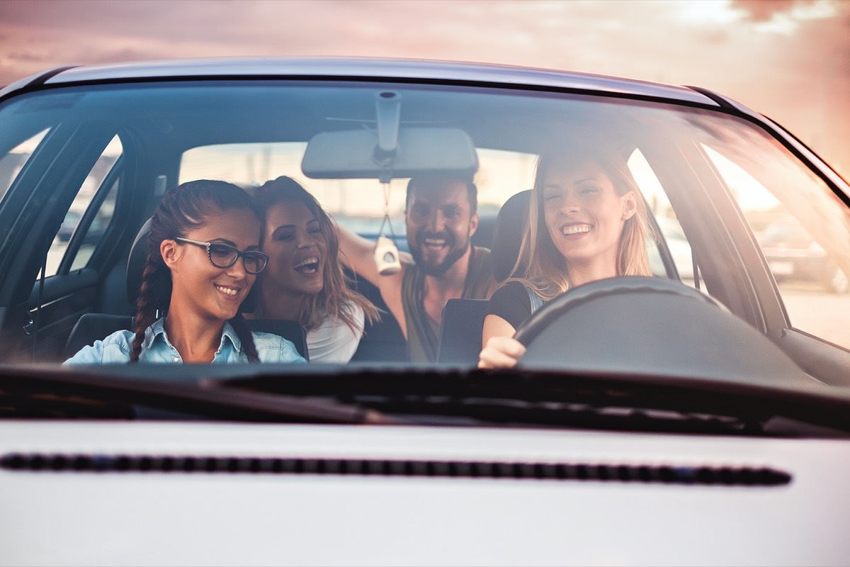 group of friends in a car