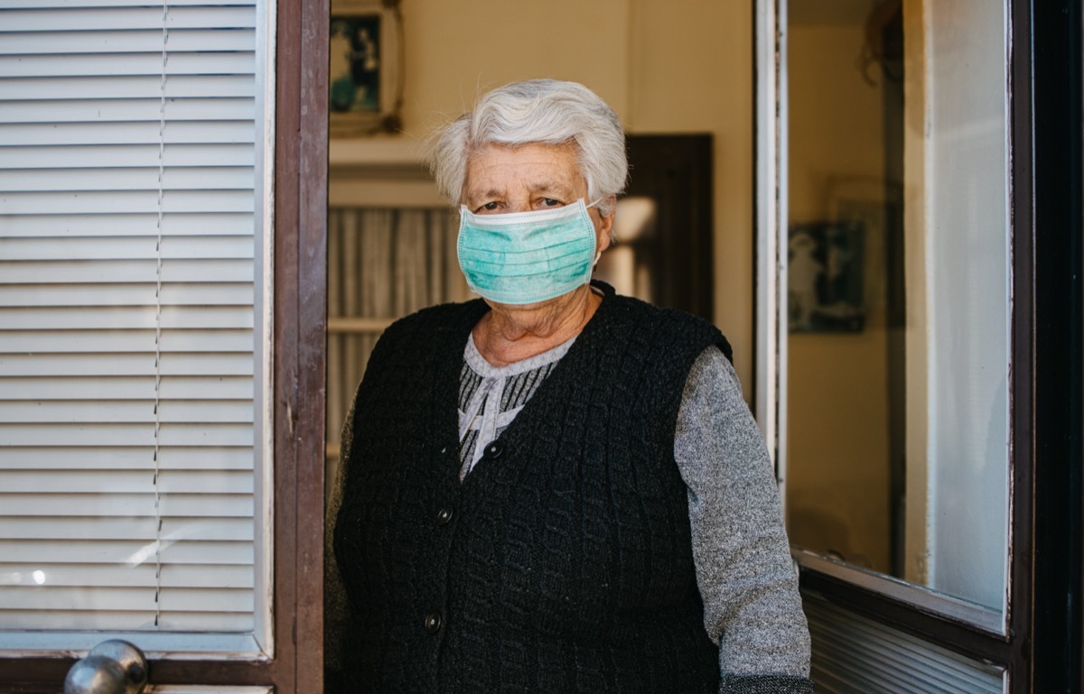 man wear mask and get a cold and cough outdoor