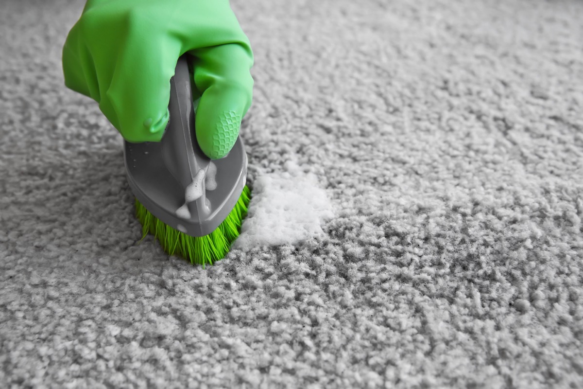 Spot cleaning carpet with scrub