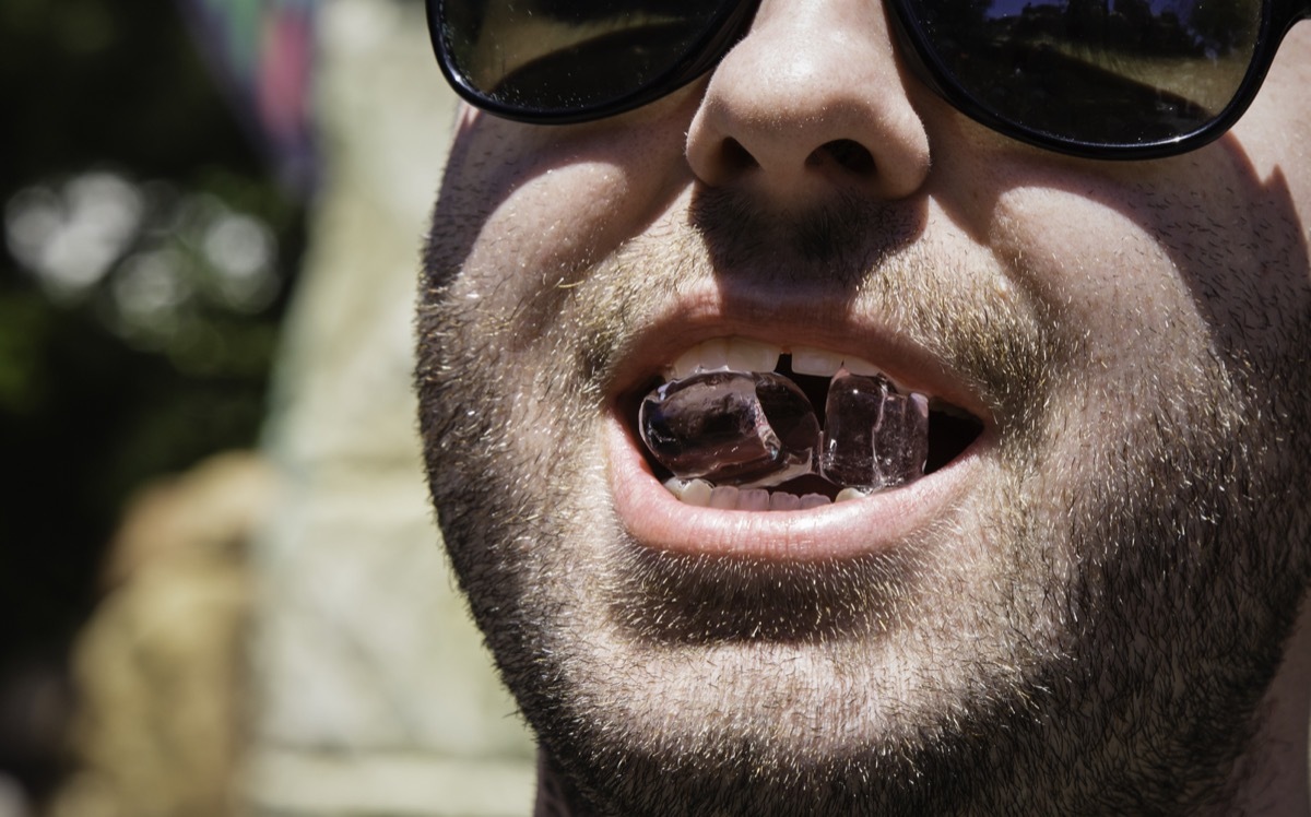 Man chewing on ice