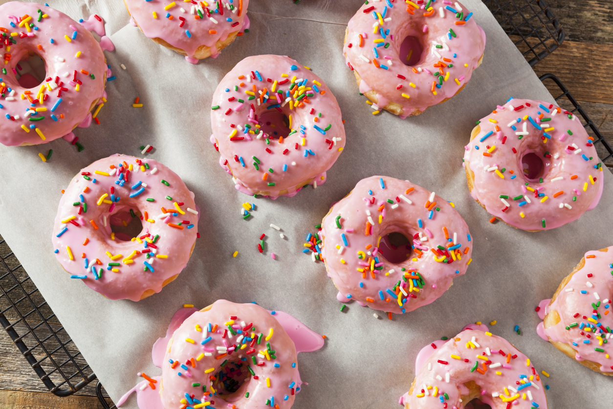 Homemade Sweet Donuts with Pink Frosting and Sprinkles