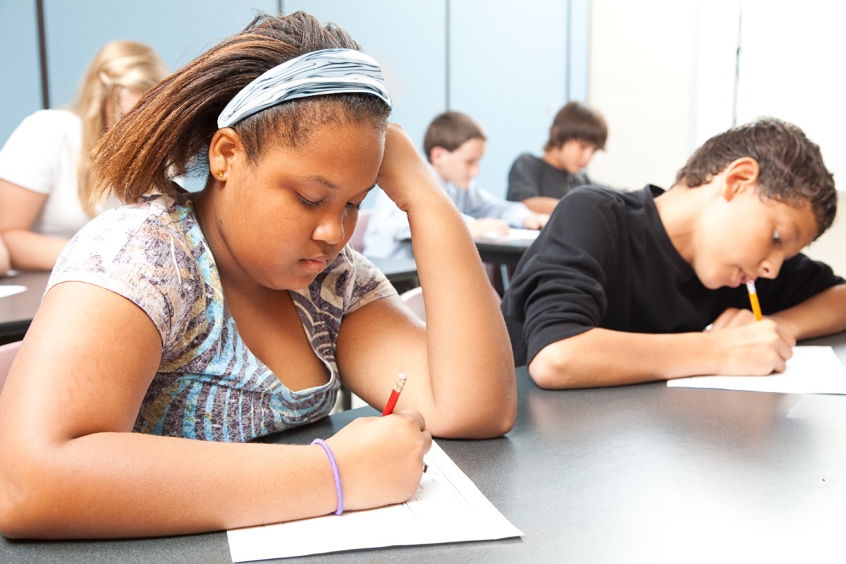 two kids taking test