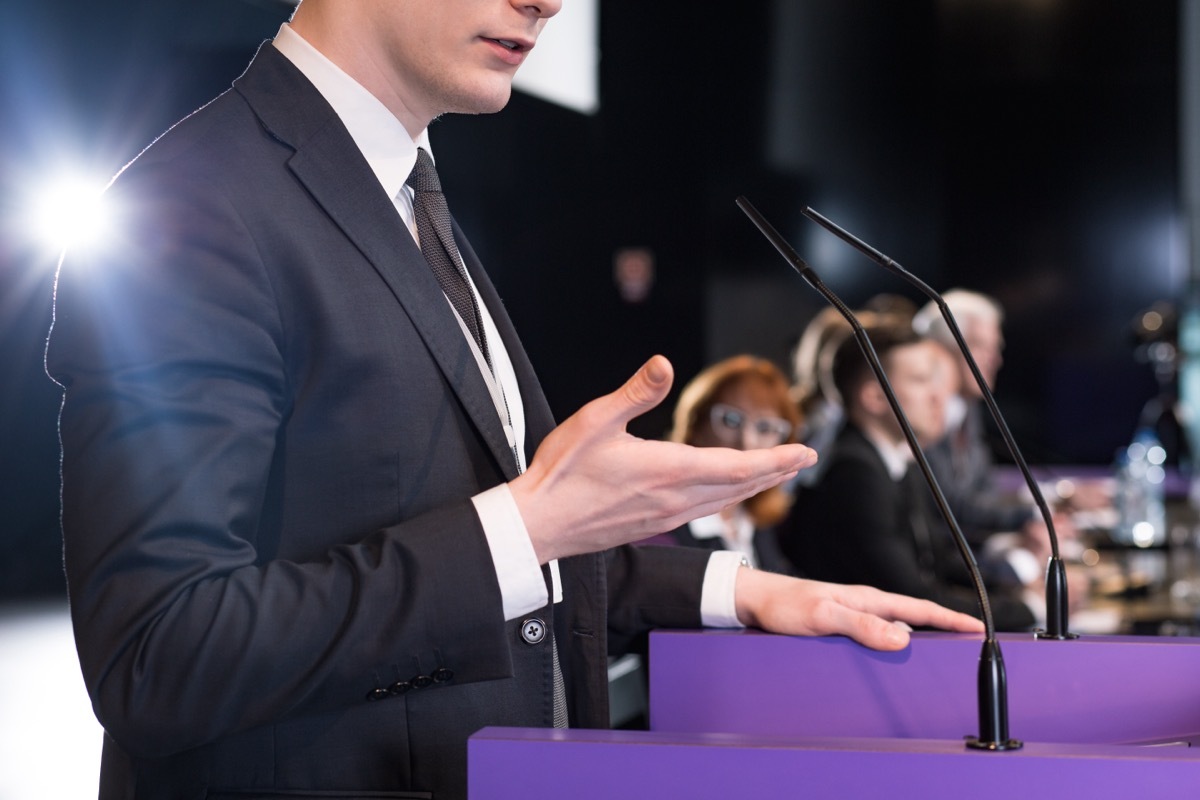 young man public speaking