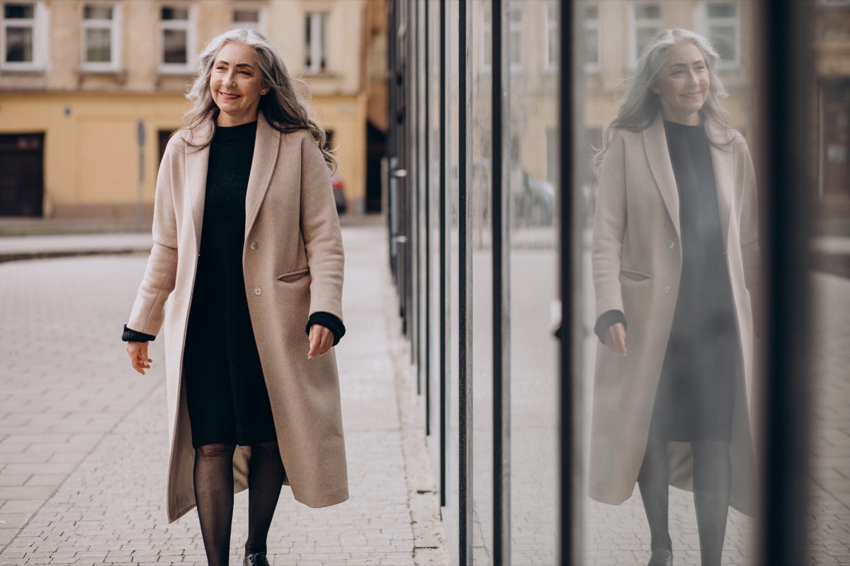 woman with grey hair outside the street