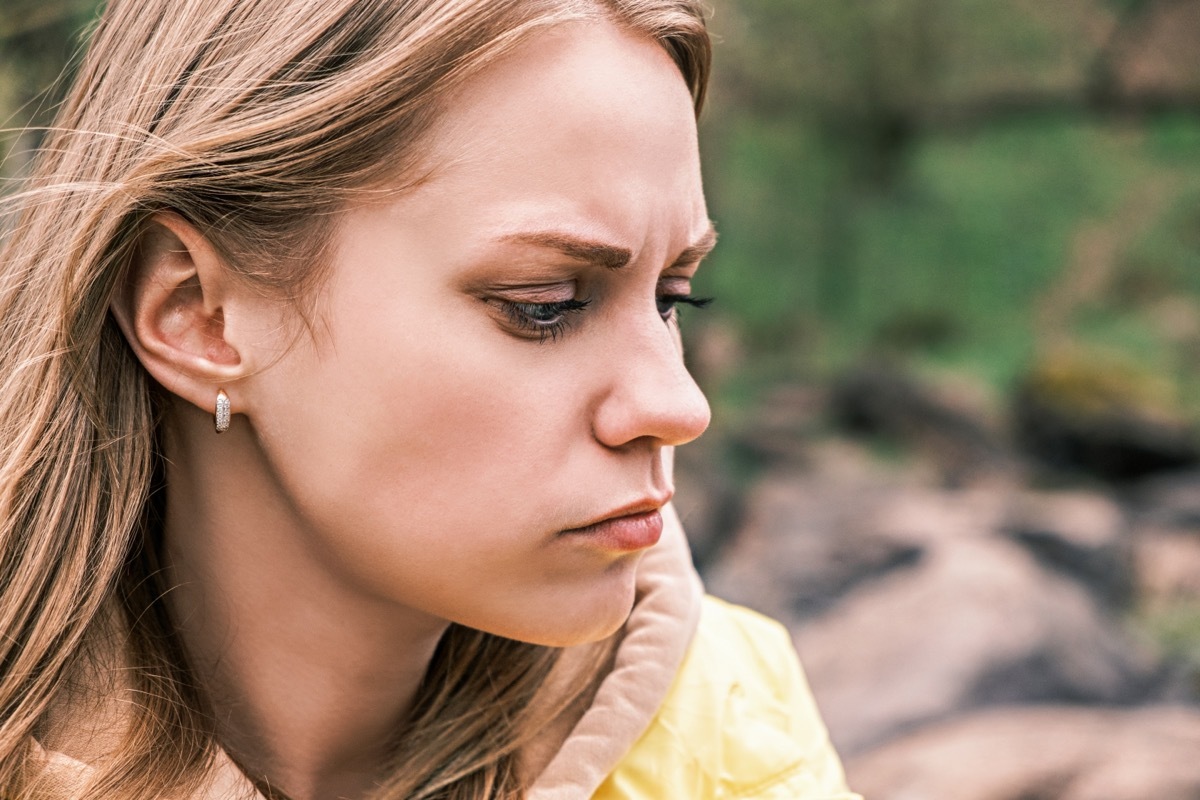 woman clenching jaw