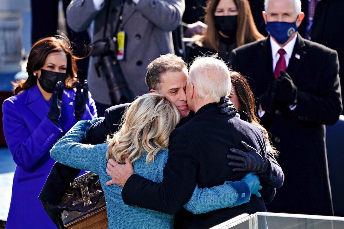 President Joe Biden(R) is comforted by his son Hunter Biden and First Lady Jill Biden after being sworn in during the presidential inauguration in Washington, DC on the West Front of the US Capitol on January 20, 2021 in Washington, DC