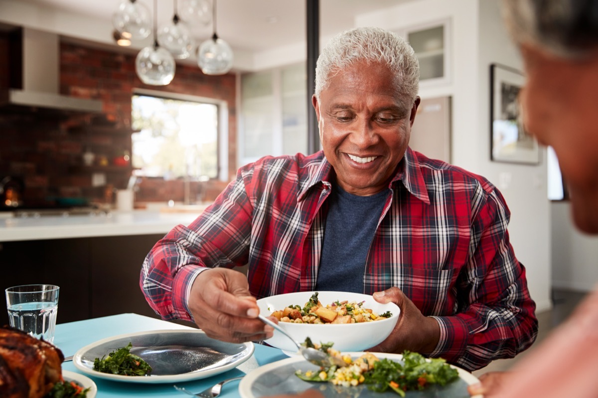 Older man eating dinner