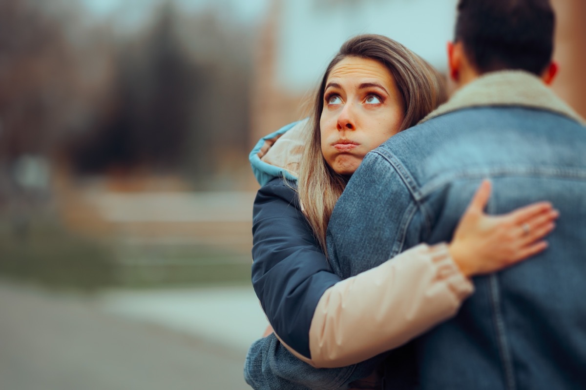 annoyed woman comforting friend