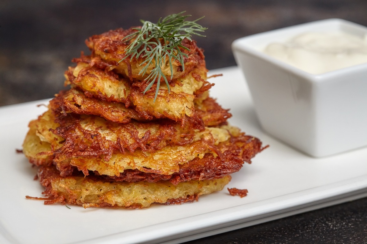 stack of latkes on white plate