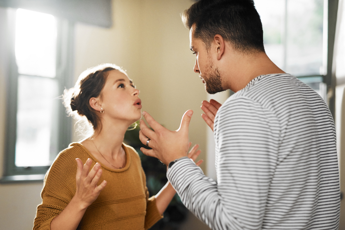 Cropped shot of a young couple having an argument at home