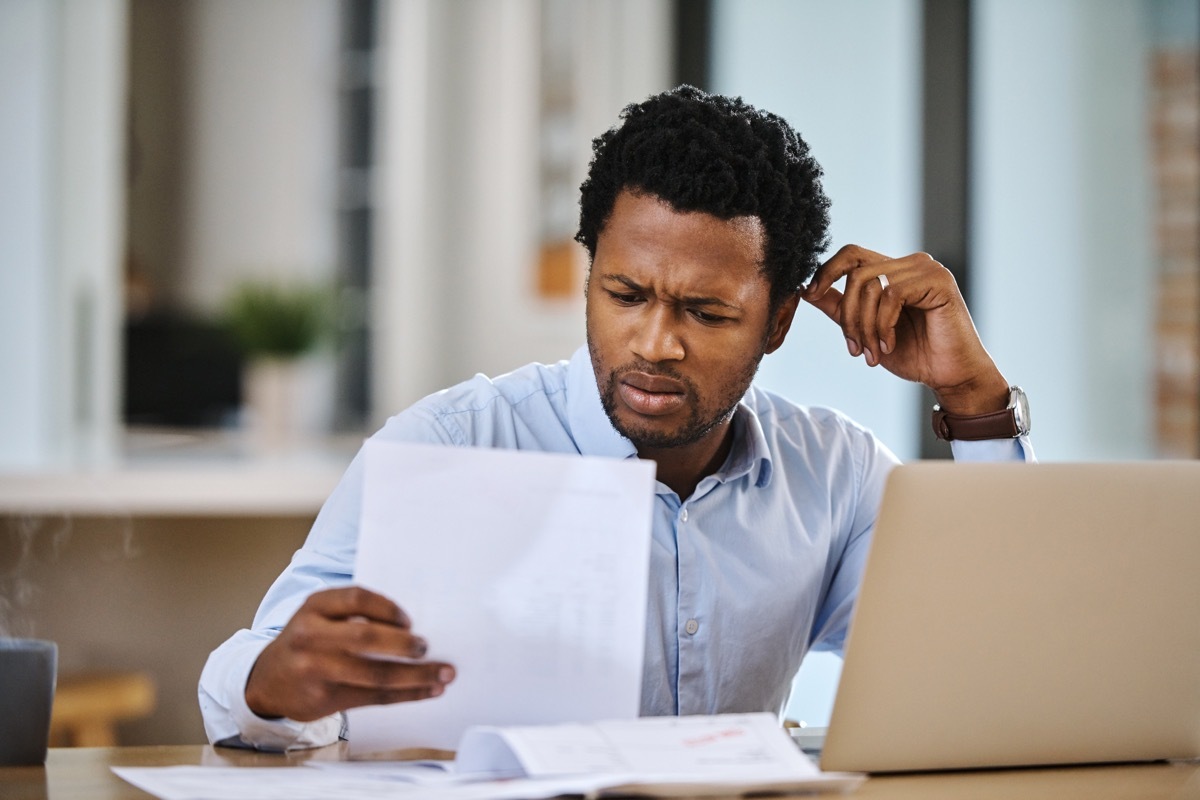 Cropped shot of a young man working from home