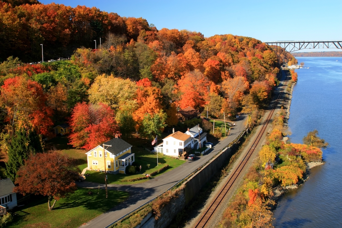 Autumn view of the west bank of the Hudson River and the Poughkeepsie-Highland Railroad Bridge, New York